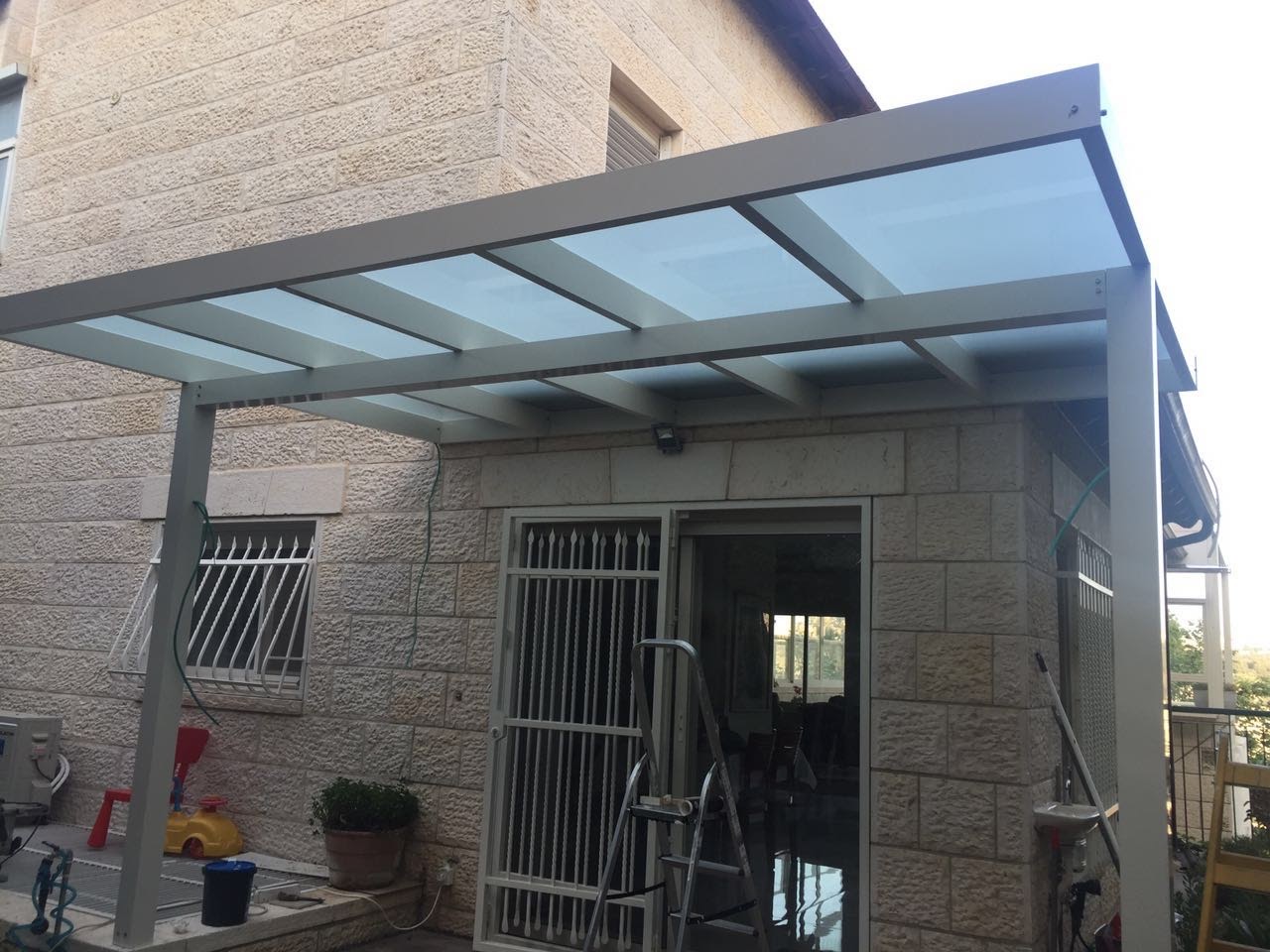 Glass roof pergola